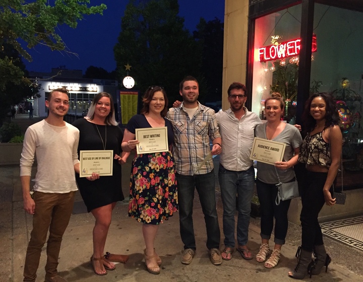 group photo with awards